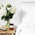 Sustainable Decor - flowers in clear glass vase on table