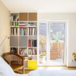 Sustainable Furniture - white wooden shelf with books