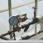 Organizing Gadgets - black and brown gauge manifold