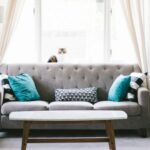 Spring Decor - brown and white wooden table beside sofa chair