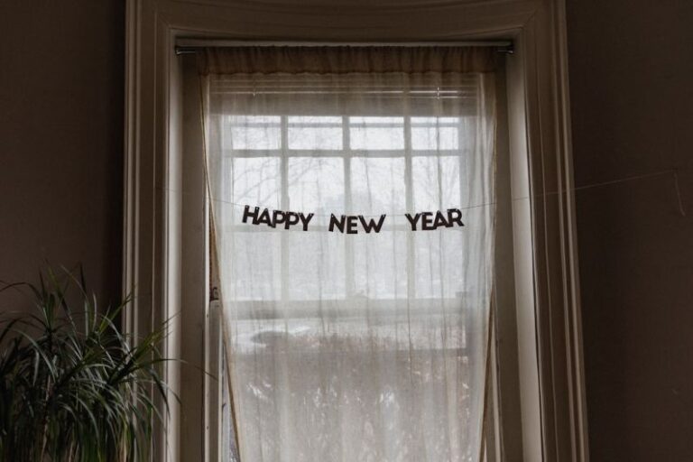 New Years Decor - white window curtain during daytime