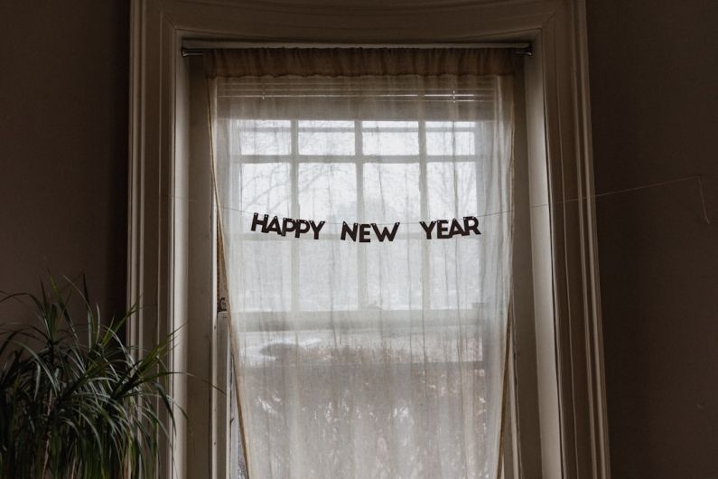 New Years Decor - white window curtain during daytime