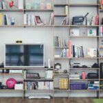 Garage Organization - flat screen TV on brown wooden shelf