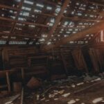 Attic Storage - a room with wood beams and wood floors