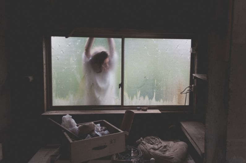 Entryway Storage - woman leaning on window